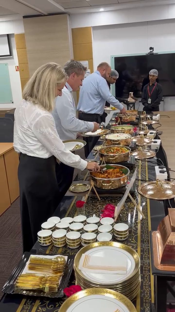 Corporate office crowd being served at a Celebrations World catering buffet in Mumbai