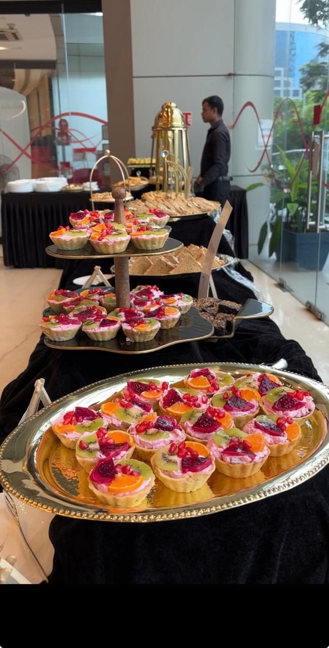 Elegant dessert tart display at a Celebrations World brand event in Mumbai